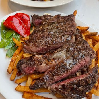 Hutch's signature dishes Steak au PoivreHutch's Famous Bibb SaladTuna TartareWild Mushroom and Truffle Pasta